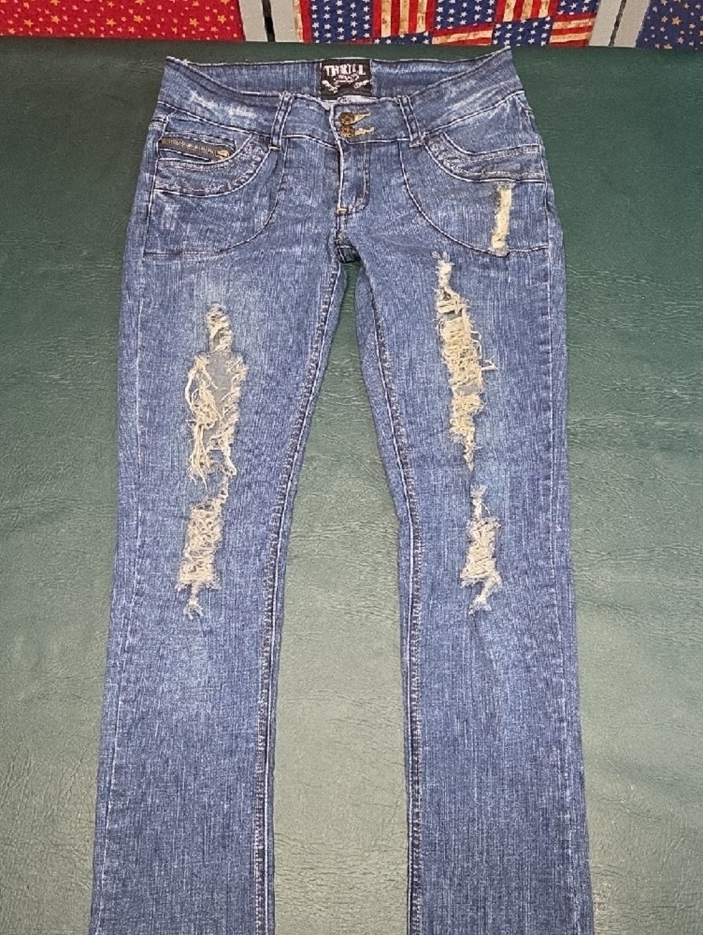 **Women’s Skinny Distressed Blue Jeans with Burgundy Patch Details** - Picture 3 of 11